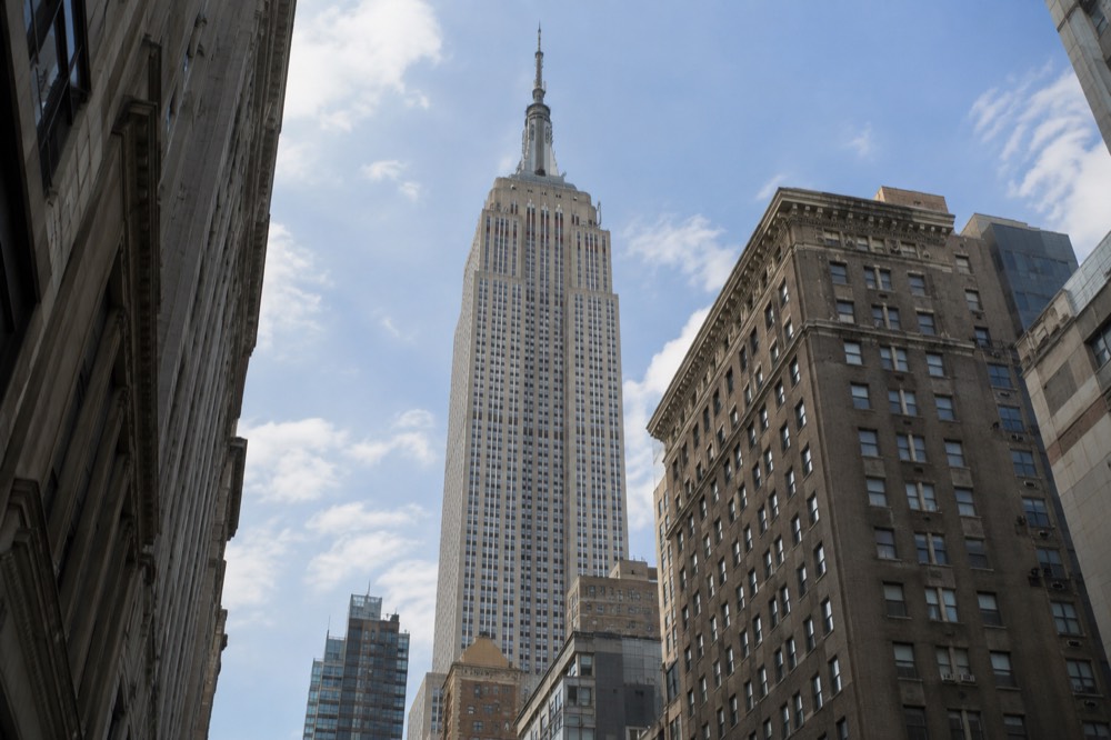 The Empire State Building rising above Midtown Manhattan on a clear day