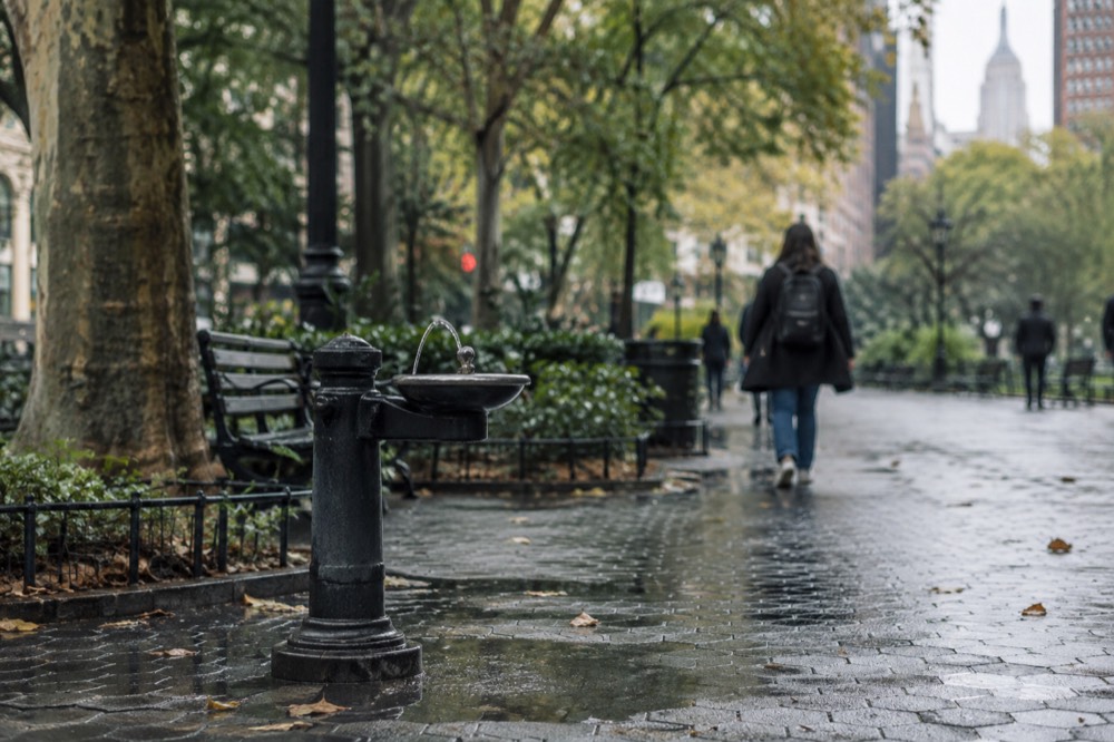 Water flowing from a public drinking fountain in a New York City park