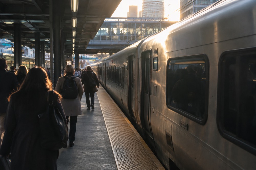 A NJ Transit train at a platform inside a New York station