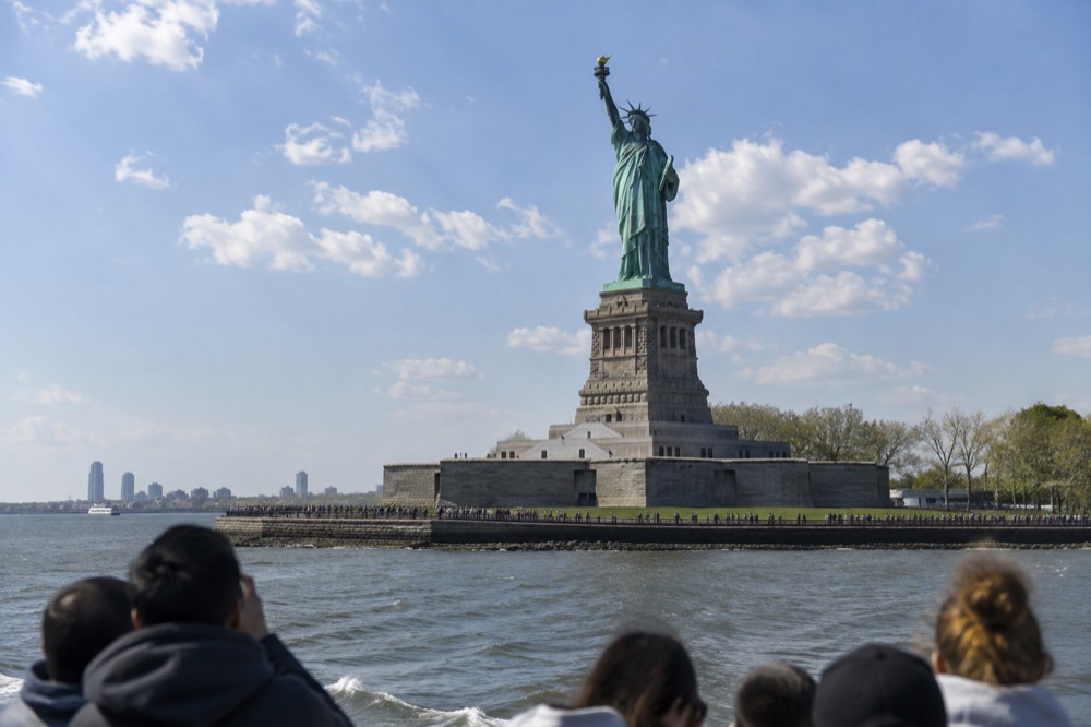 The Statue of Liberty seen from a ferry crossing New York Harbor