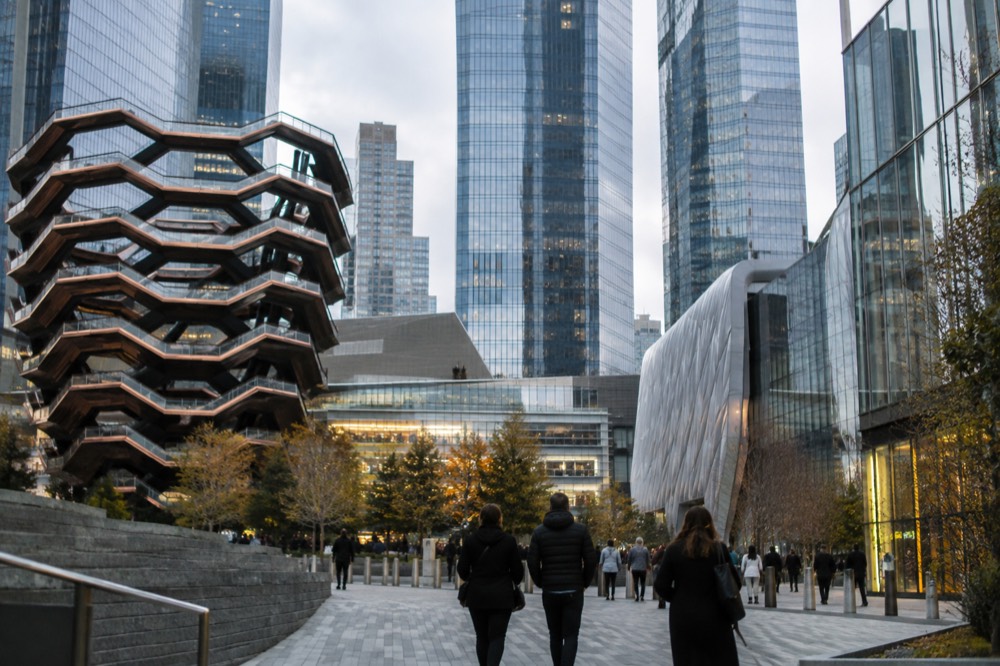 Glass skyscrapers of Hudson Yards seen from the plaza on a clear afternoon
