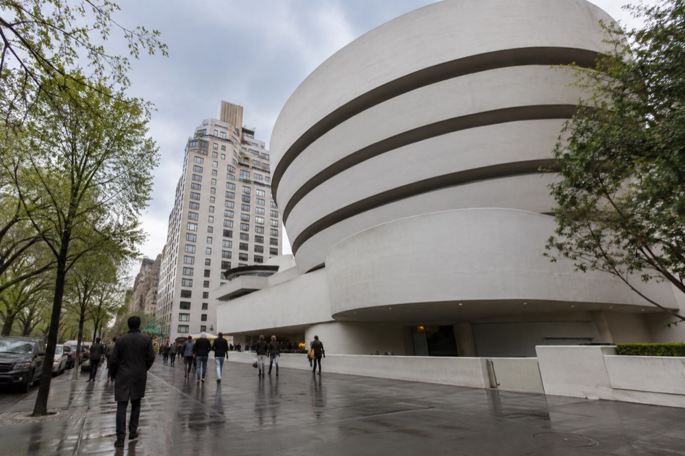 The Upper East Side sidewalk on Fifth Avenue with the Guggenheim entrance ahead