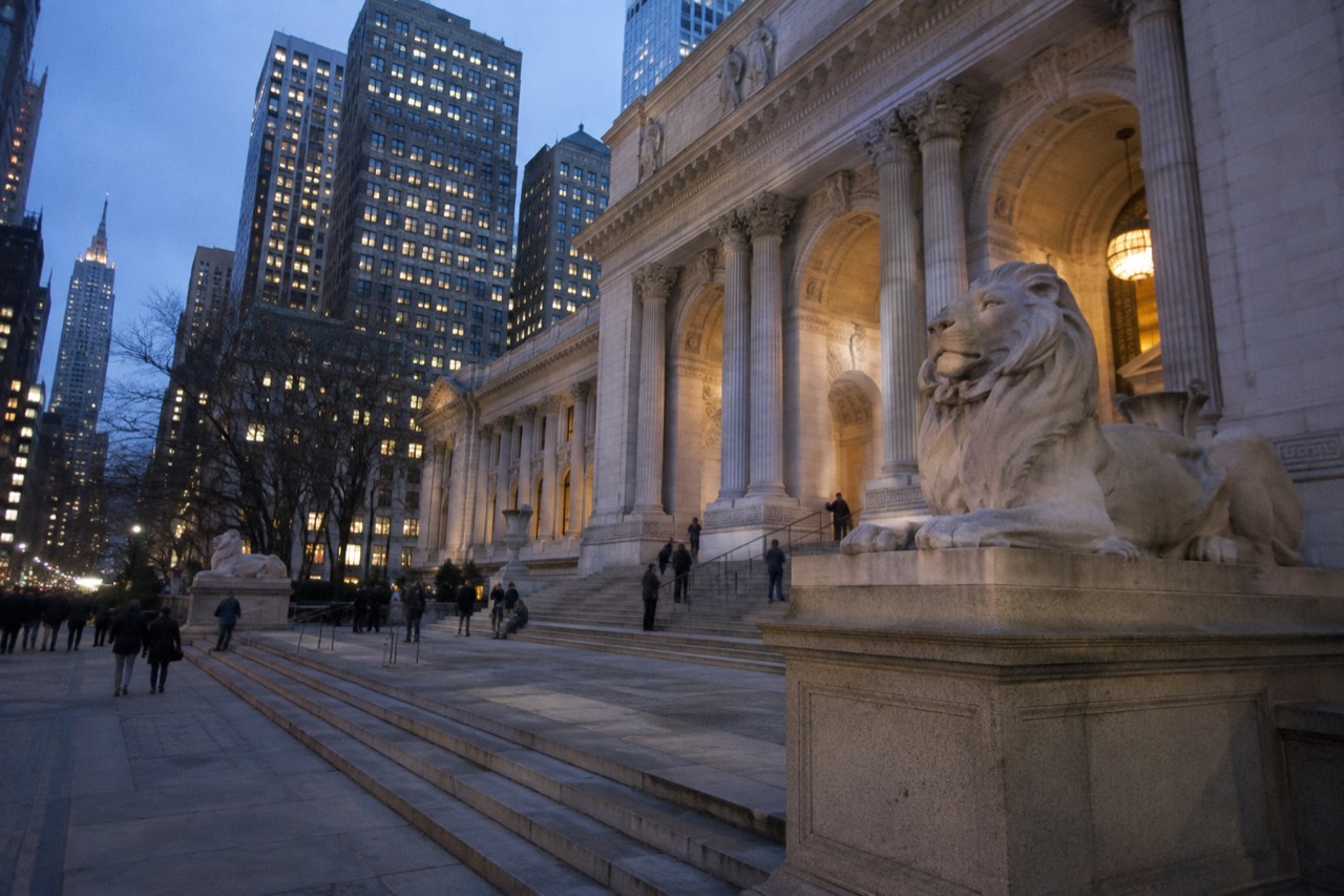 The marble facade and twin stone lions of the New York Public Library's main branch on Fifth Avenue