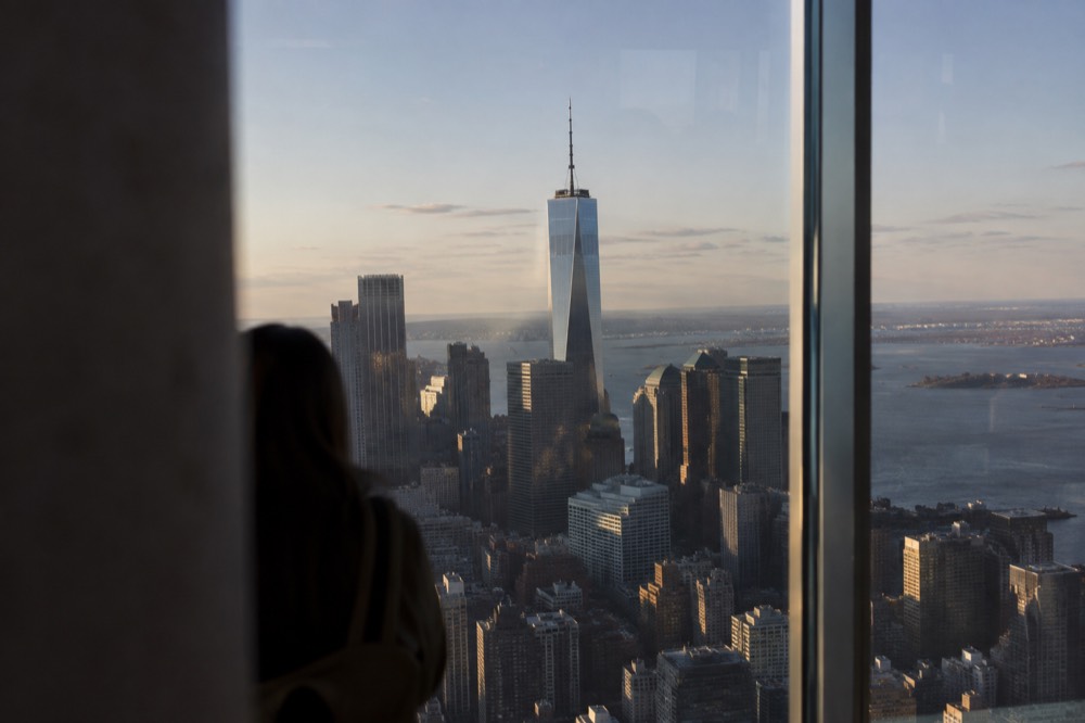 The glass tower of One World Trade Center rising above the Lower Manhattan skyline