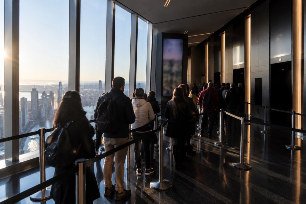 Ticket holders queueing at the elevators inside the One World Observatory concourse