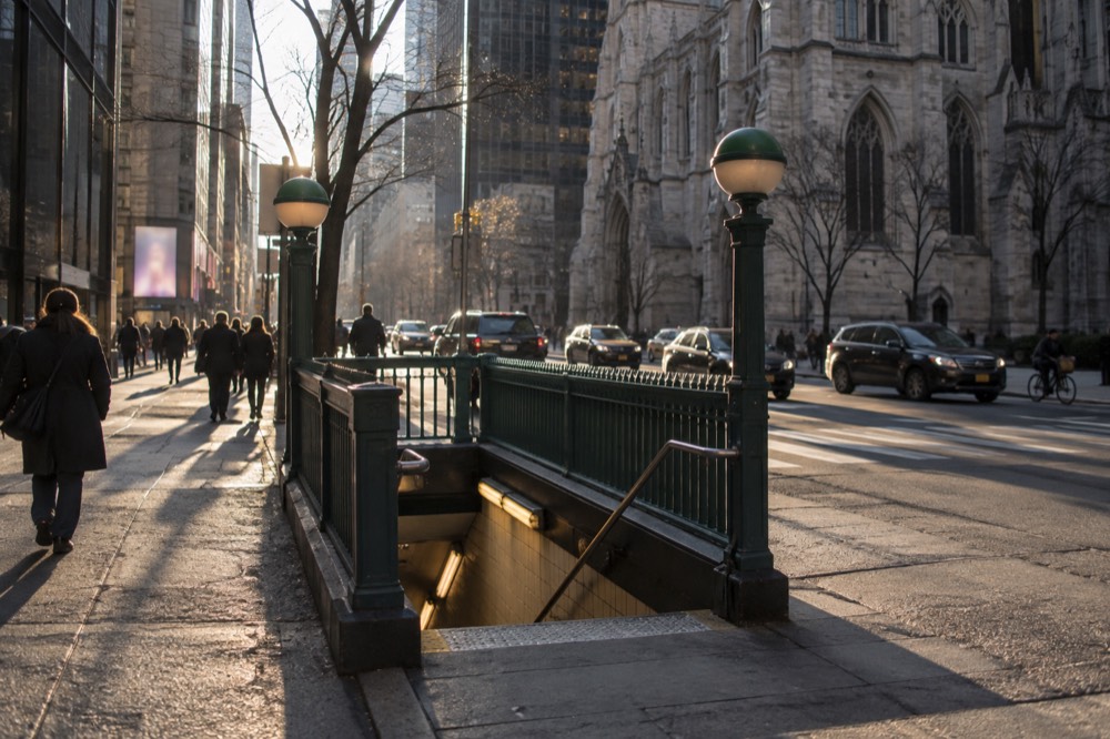A subway entrance on a Midtown street corner a short walk from the cathedral