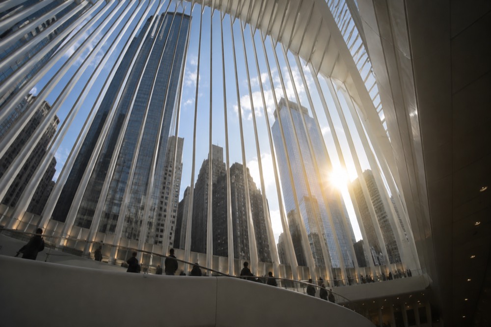Looking up through the white steel ribs of The Oculus toward the sky