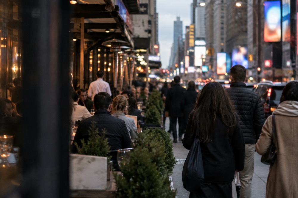 A busy restaurant row on Ninth Avenue in Hell's Kitchen at dinner time