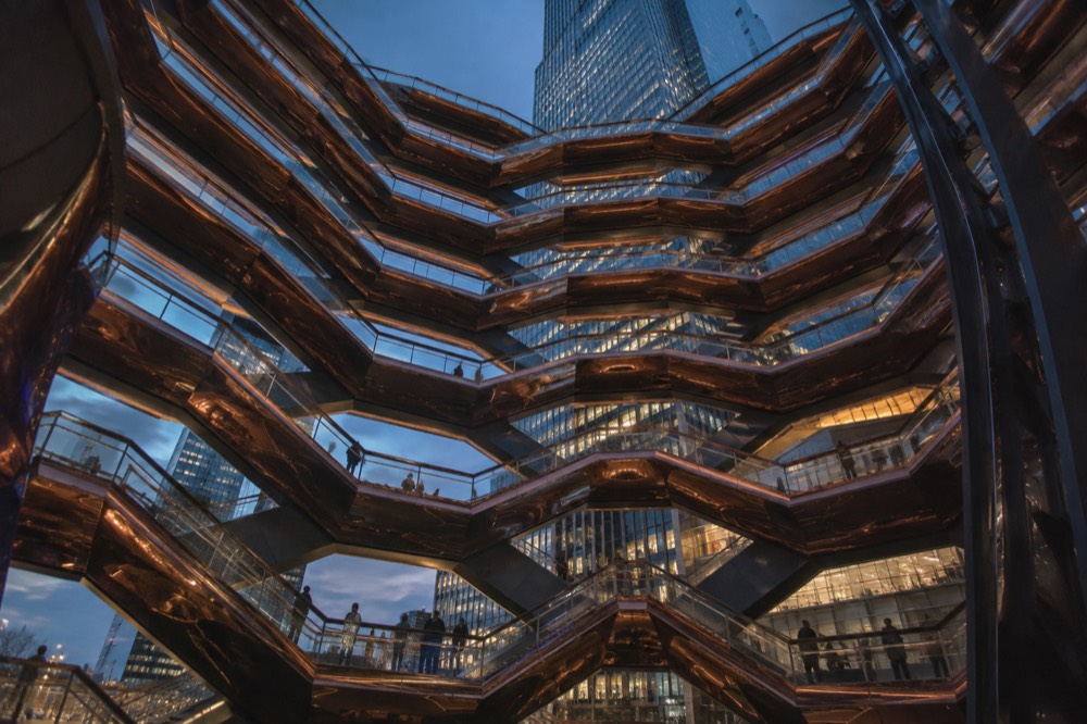 The lattice of copper staircases inside Vessel seen from the plaza below