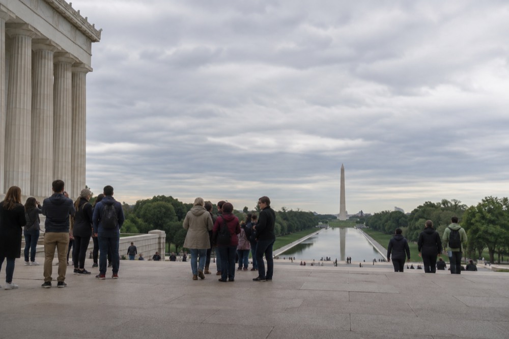 Tour group gathered near the Lincoln Memorial steps in Washington DC