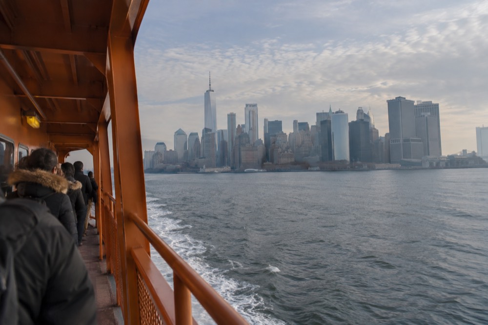 The Staten Island Ferry crossing New York Harbor toward Lower Manhattan
