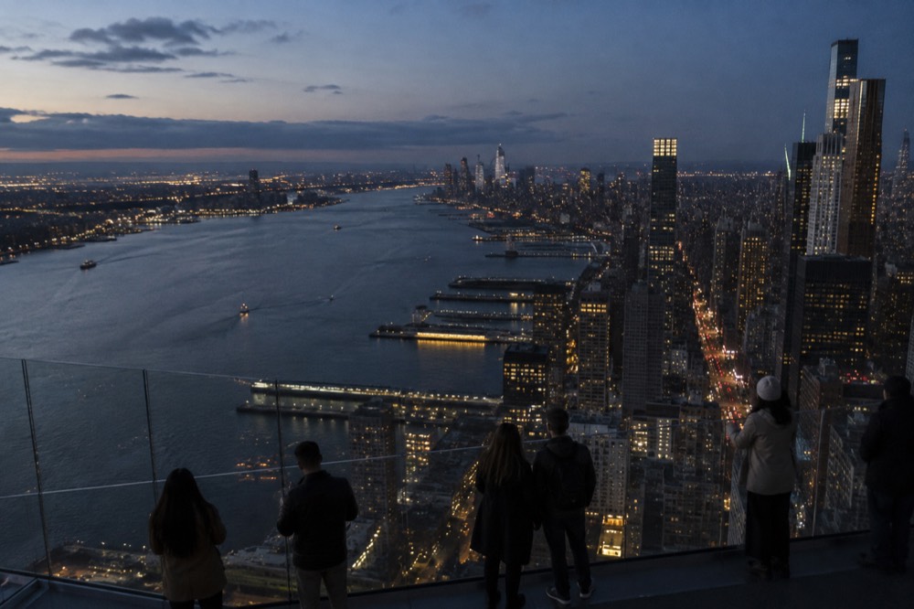 Visitors on the observation deck at Edge looking out over the Hudson