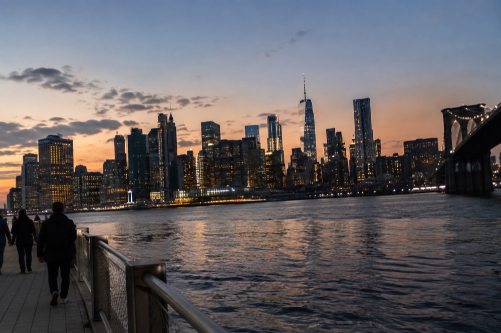 The Manhattan skyline at golden hour seen from across the East River