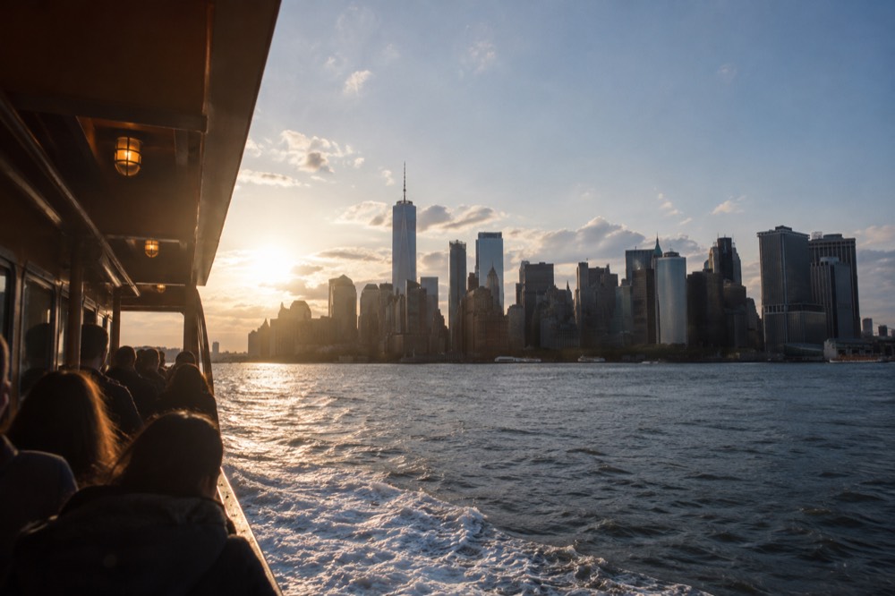 The Staten Island Ferry crossing New York Harbor with Lower Manhattan behind it