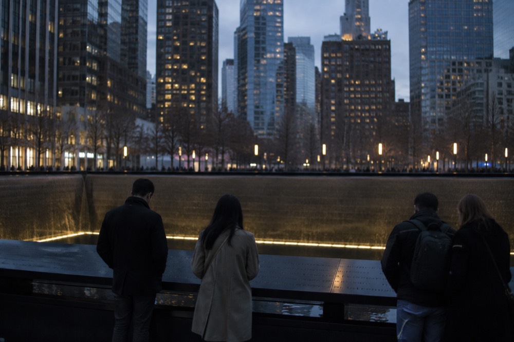 The 9/11 Memorial reflecting pool with names inscribed around its edge